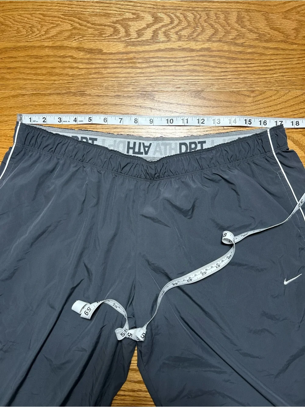 Women’s Nike the athletic dept Track Capris Grey with White Size XL